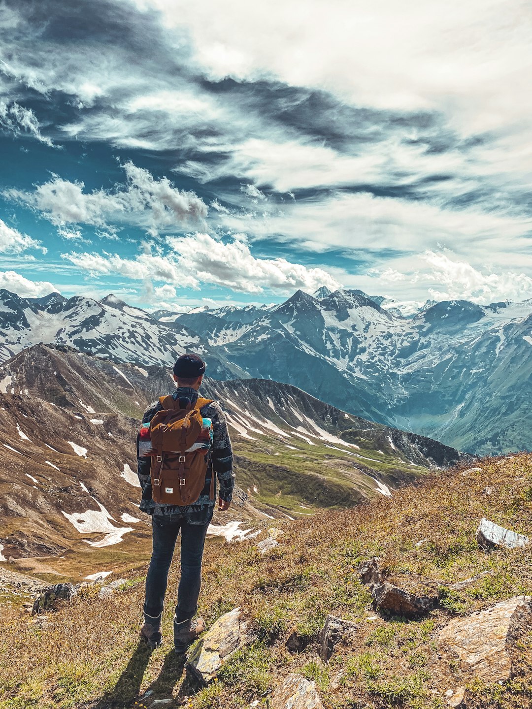person hiking mountain trail