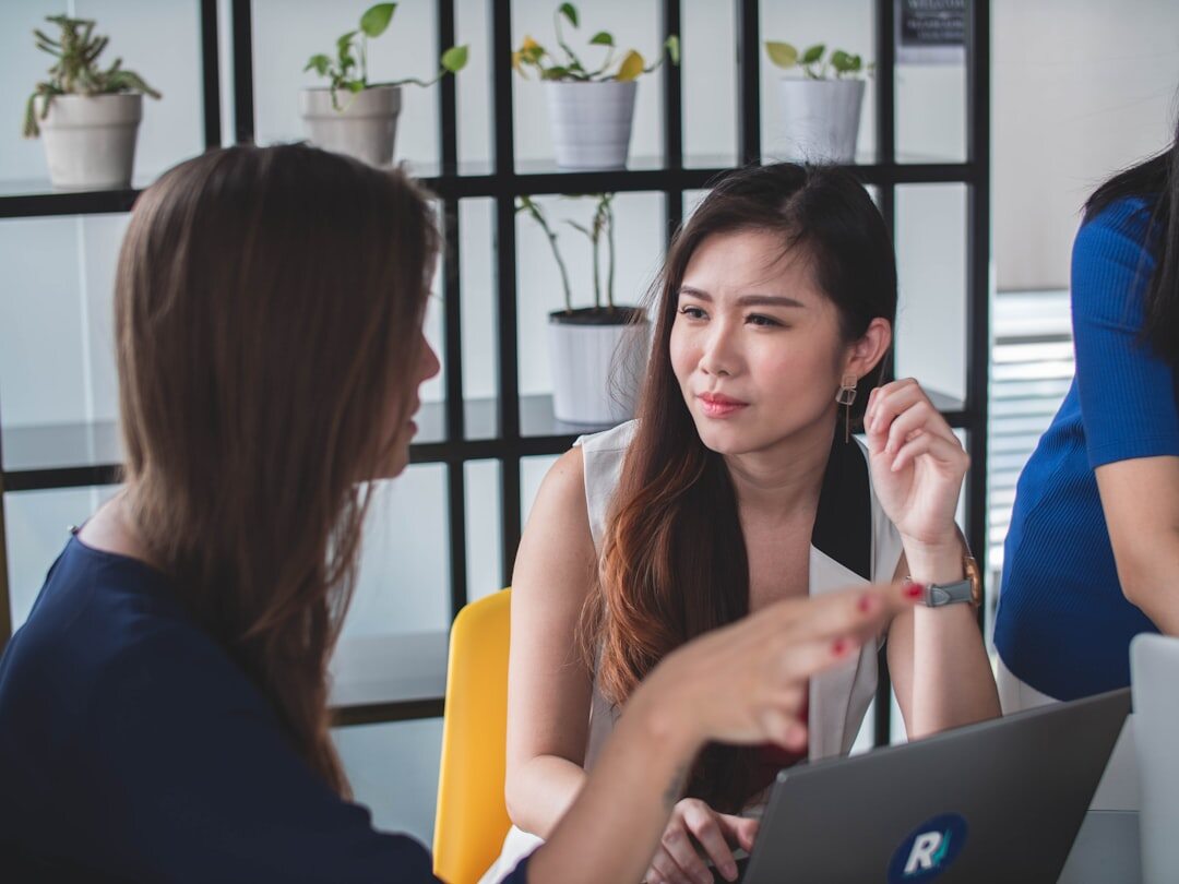 professional woman speaking in meeting