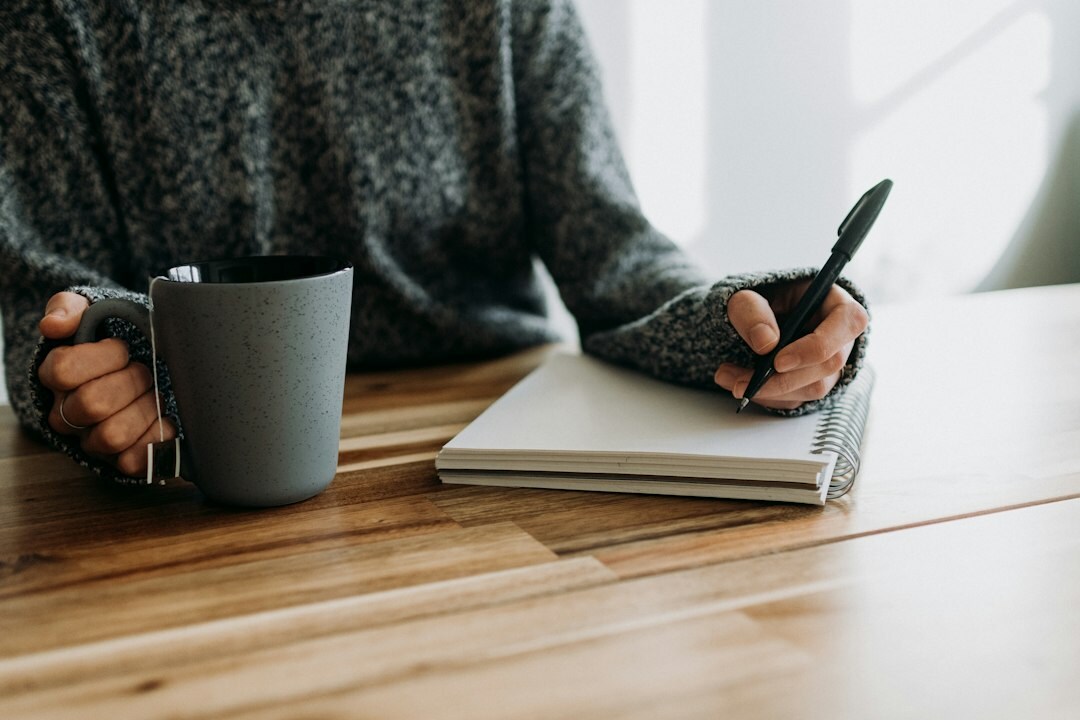 person writing notes