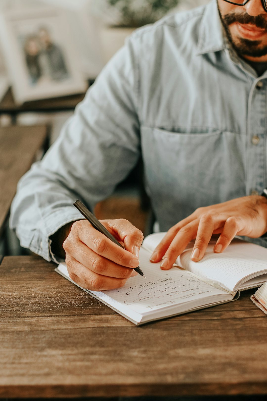 person journaling emotions